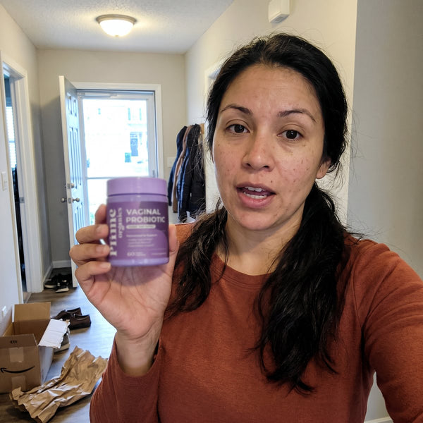 R. Delgado holding the jar